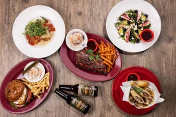 Crunchy U.S. beef Cuba Rolls, Baby Back pork ribs, U.S. Chicken Parmesan, with Rice Pilaf, Supergreen Salad and Dan’s Classic Cheeseburger with Samuel Adams beer