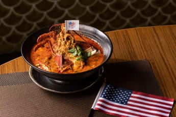 Boston lobster Two Ways; Half Served in Tom Yum Soup & Half in Dill Butter