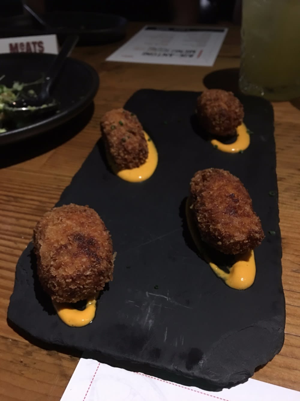 Croquettes with Iberian ham, piquillo pepper and lemon