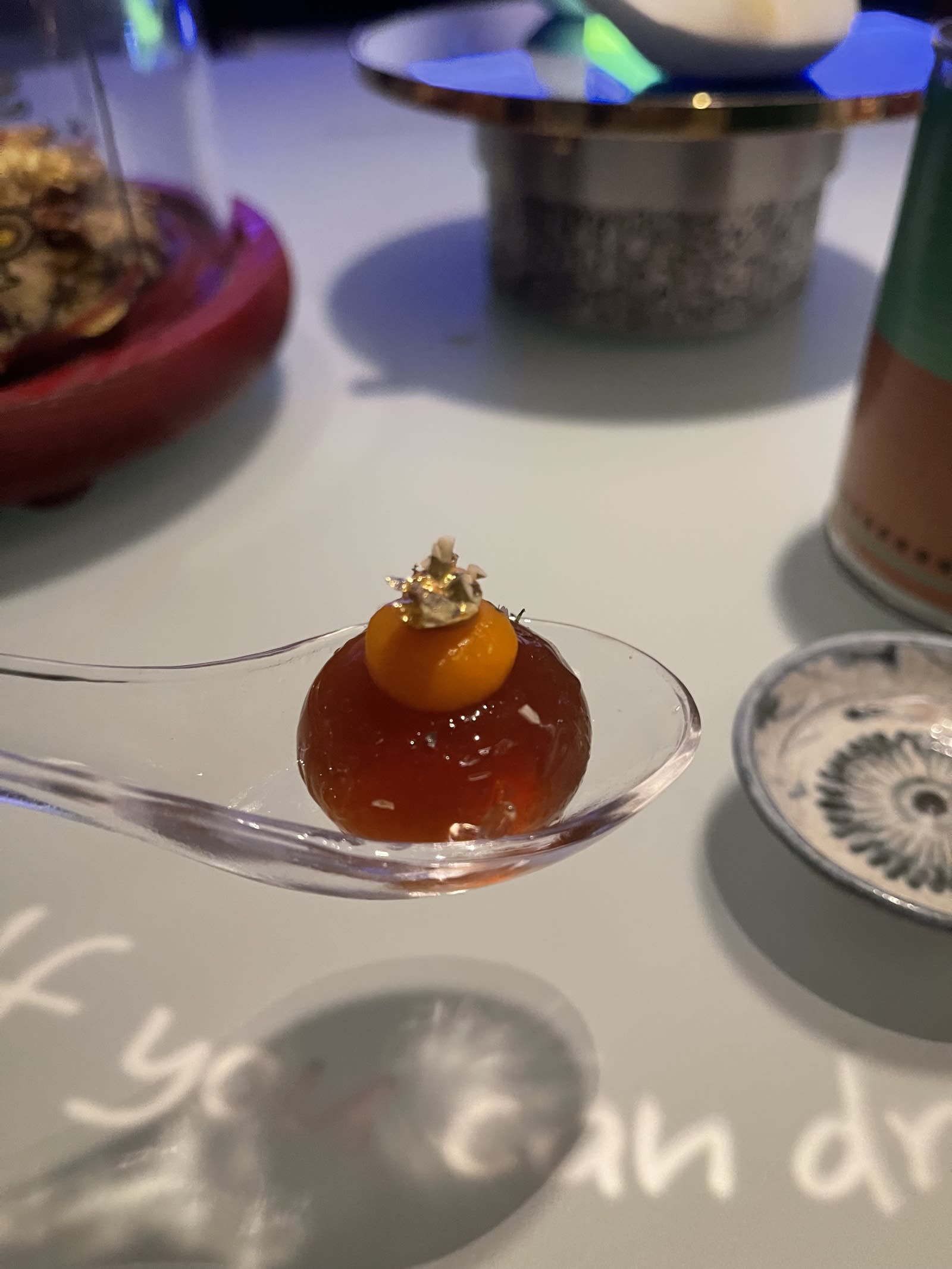 Pumpkin soup with gold flakes, as part of the "Soup by Andy" arrangement