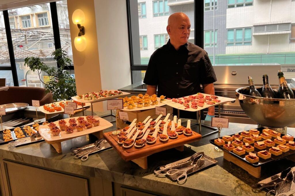 Delicious Catering HK Dennis Villanueva working