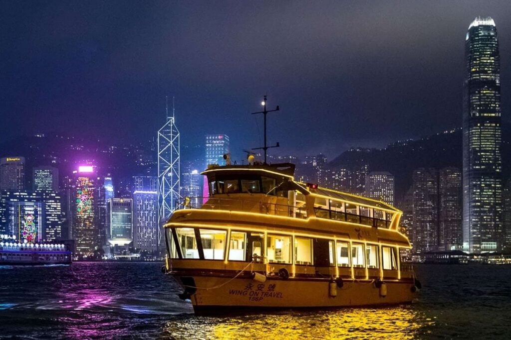 This Victoria Harbour night cruise offers unlimited drinks for 70 minutes on the water Victoria Harbour nighttime drinks cruise