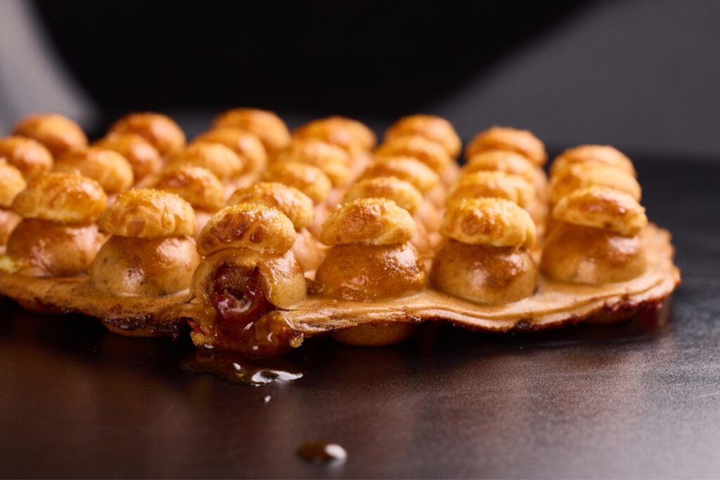 Chicken Egg Boy reveals new char siu-stuffed pineapple bun egg waffle in Sheung Wan