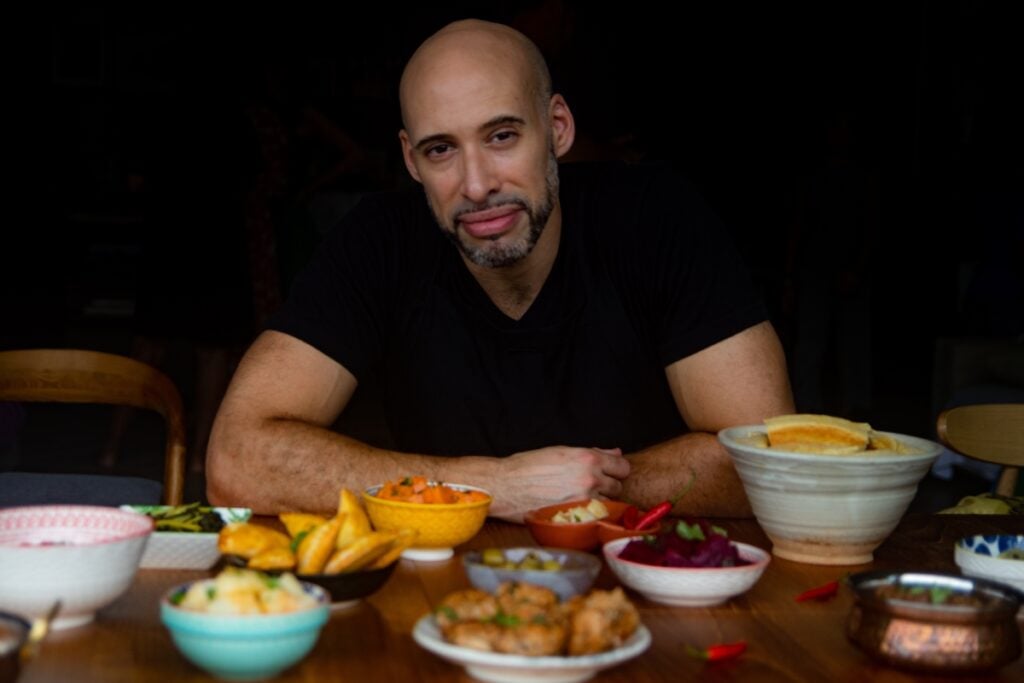 Hakim Meddour takes North African home comforts to Hong Kong with catering company Kendira 3 Hakim Meddour on table Kendira catering